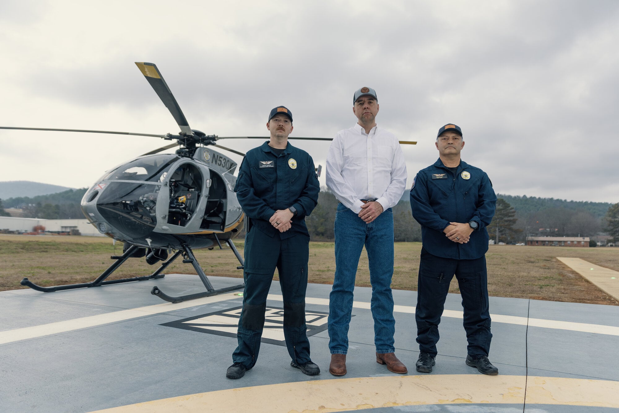 Jay Mitchell with helicopter crew